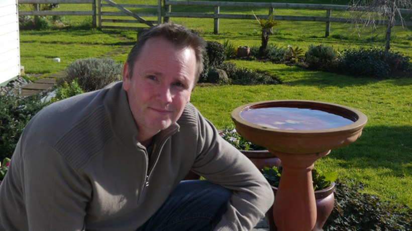 The founder of NZ Garden Design in an Auckland garden